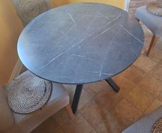 Black marble effect round table
