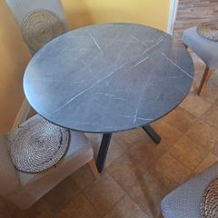Black marble effect round table