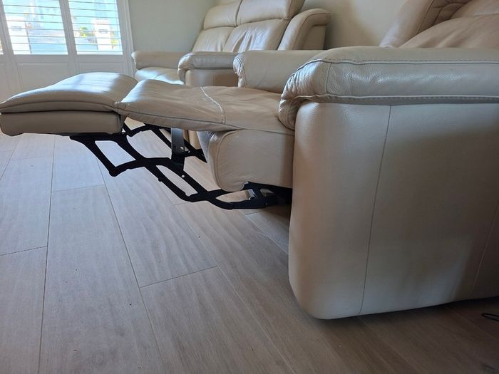 Italian leather sofa and reclining armchair