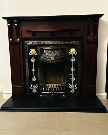 Mahogany Fireplace complete with Gas fire and stone.