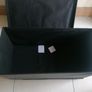 Black faux-leather folding storage ottoman Image 2