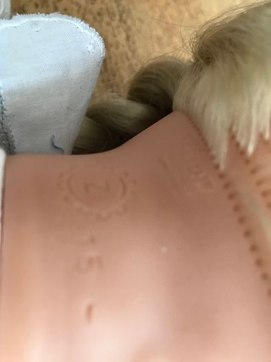 Pre-loved dressed soft body doll