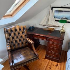 Chesterfield captain chair and partners desk