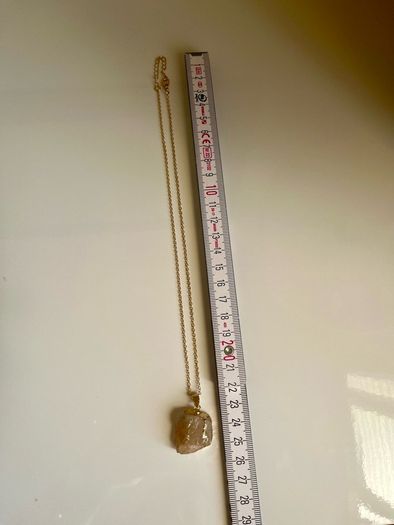Costume necklace with stone pendant