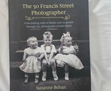 The 50 Francis Street Photographer. A Fascinating View Of Dublin And Its People Through The Photographs Of John Walsh. By Suzanne Behan. First Edition Large Volume Hardback With Dustjacket In Good Condition.  See Photos For Same.