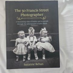 The 50 Francis Street Photographer. A Fascinating View Of Dublin And Its People Through The Photographs Of John Walsh. By Suzanne Behan. First Edition Large Volume Hardback With Dustjacket In Good Condition.  See Photos For Same.