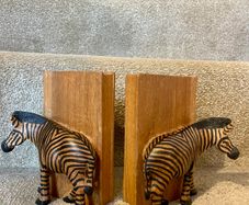 Early c20th hand-carved wooden zebra bookends