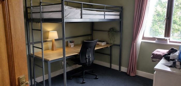 Over desk single bed.