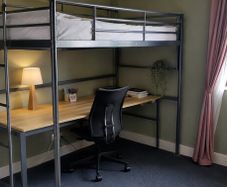 Over desk single bed.