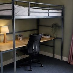 Over desk single bed.