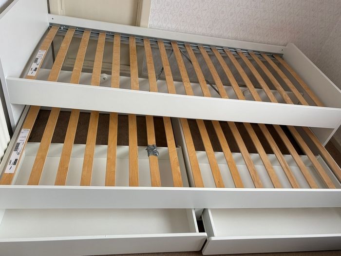 single bed with storage and pull out bed.