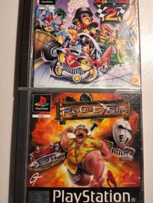 Rogue Trip vacation 2012 + Motor Toon 2 Grand Prix PS1 PlayStation