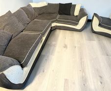 Dark grey corner sofa with matching armchair