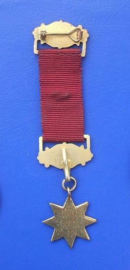 ORDER OF THE LADIES GLADE (OLG) - PRIMA degree White Rose member's medal (1978). Inscribed with recipient's name. A scarce medal.