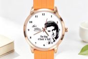 Elvis Presley themed wristwatch with orange strap