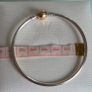Pandora Moments two-tone bangle ir sterling silver with a 14k yellow gold ball clasp. (Size approx 19cm) for the right size please check all the photos (the bracelet is in very good condition) Image 8