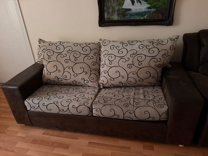 Brown leather-look sofa and armchair set