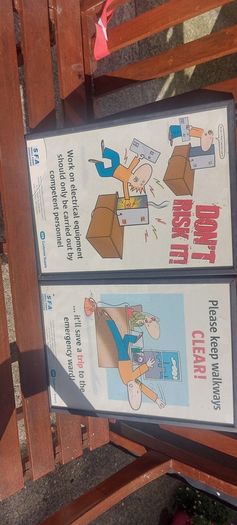2 x framed safety pictures for ESB illustrated images,,,buyer collects, nice for any advertising wall display,,one glass broke on one picture,but can be easy replace ,,sold as seen,I reckon 80s 90s