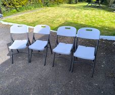 White plastic Foldable Chair x 4