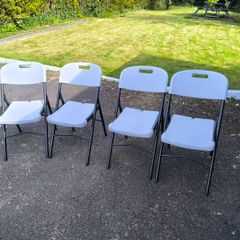 White plastic Foldable Chair x 4
