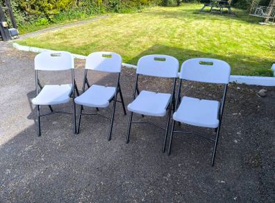 White plastic Foldable Chair x 4