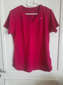 Nike short sleeve top cotton size medium in very good condition with no issues see last two photos for exact measurements FREE STANDARD POSTAGE INCLUDED