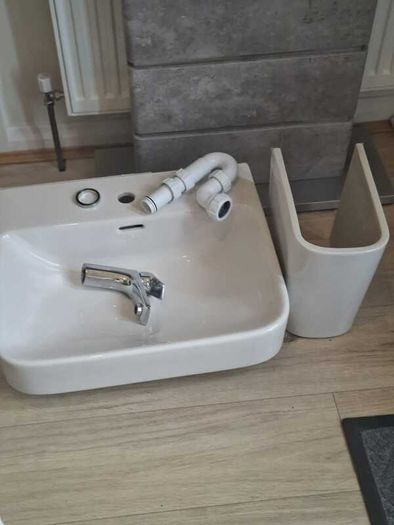 Basin with tap