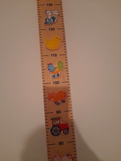 Wooden height rule/chart