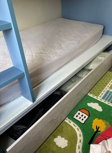 Kids bunk bed with storage