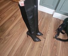 thigh high heeled leather boots
