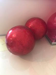 2 red decorative balls