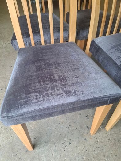 Set of 4 light wood dining chairs with grey fabric seats