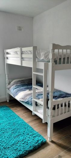 single wooden bunk bed. White