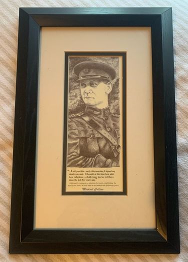 Framed pictures of Wolf Tone, Collins and De Valera