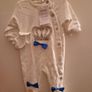 A selection of brand new baby clothes and items Image 7