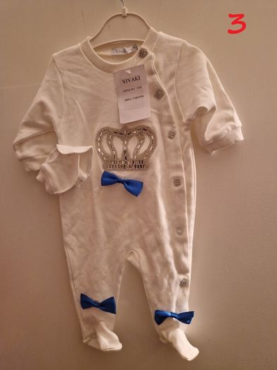 A selection of brand new baby clothes and items