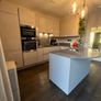 KUBE Modern High-Gloss Kitchen & AEG Appliances Image 2