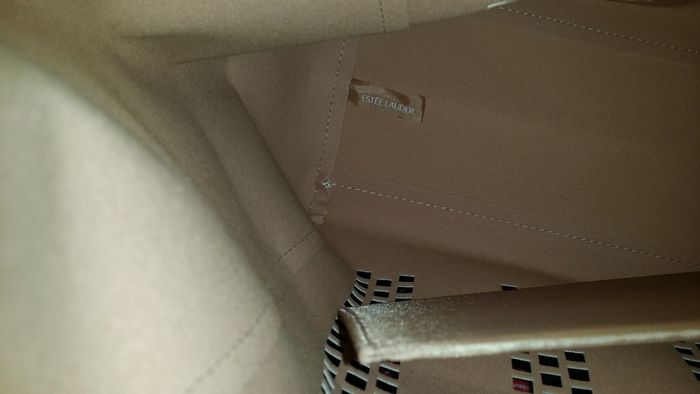 Estee Lauder gold bag