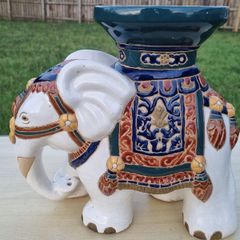 Vintage ceramic flower stand in the shape of an elephant