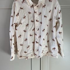 Long sleeve cream shirt with reindeer