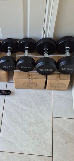 brand new 2x12.5kilo, 2x10kilo dumbbell weight sets