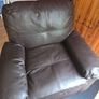 dark brown faux leather armchair. Image 4
