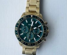 Fossil watch with green dial