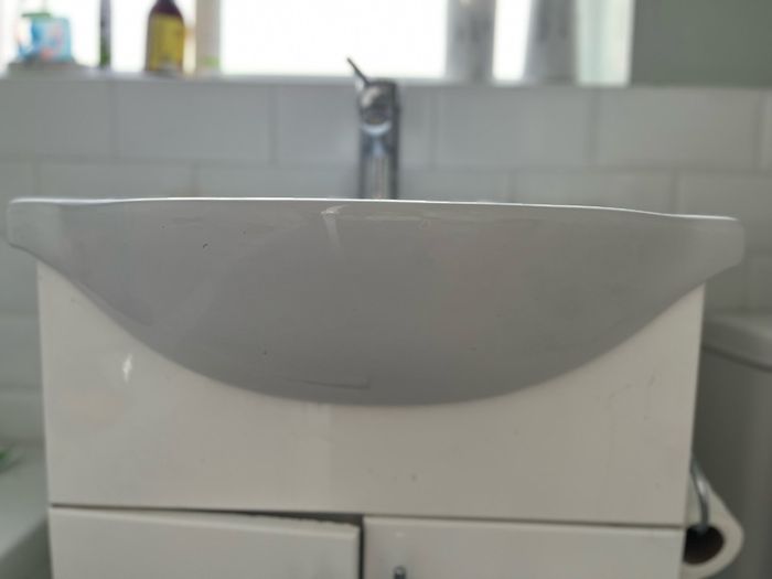 white sink bathroom- not including tap