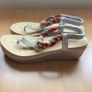 Ladies silver and multicolored toe post sandals size 5 Image 4