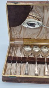 Cutlery set in a box .
