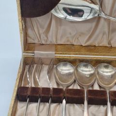 Cutlery set in a box .