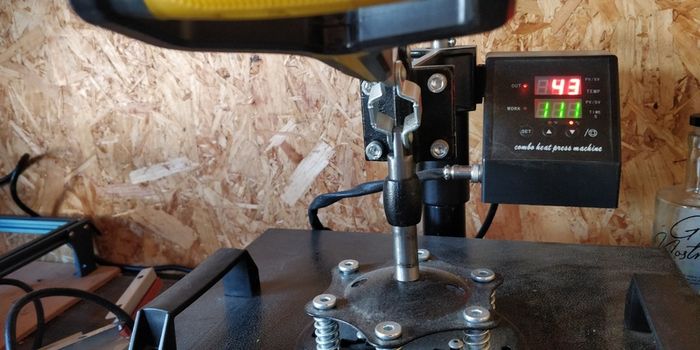 Heat press machine with mug and hat attachments