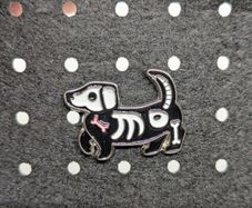 Skeleton dog enamel pin