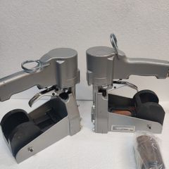 Top closing staplers with clamping anvils